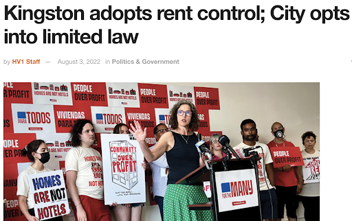 Screenshot of Hudson Valley 1 article with photo of a press conference with housing activists and former State Senator Jen Metzger speaking at a podium. Headline reads: Kingston adopts rent control; City opts into limited law