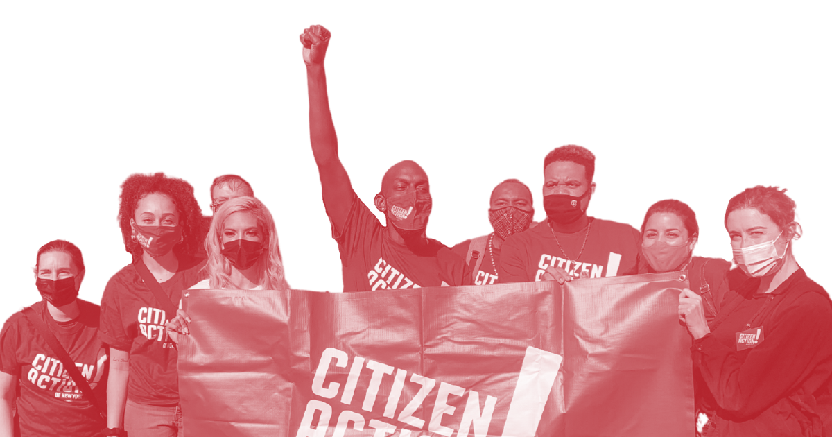 A group of Citizen Action members holding an organizational banner.